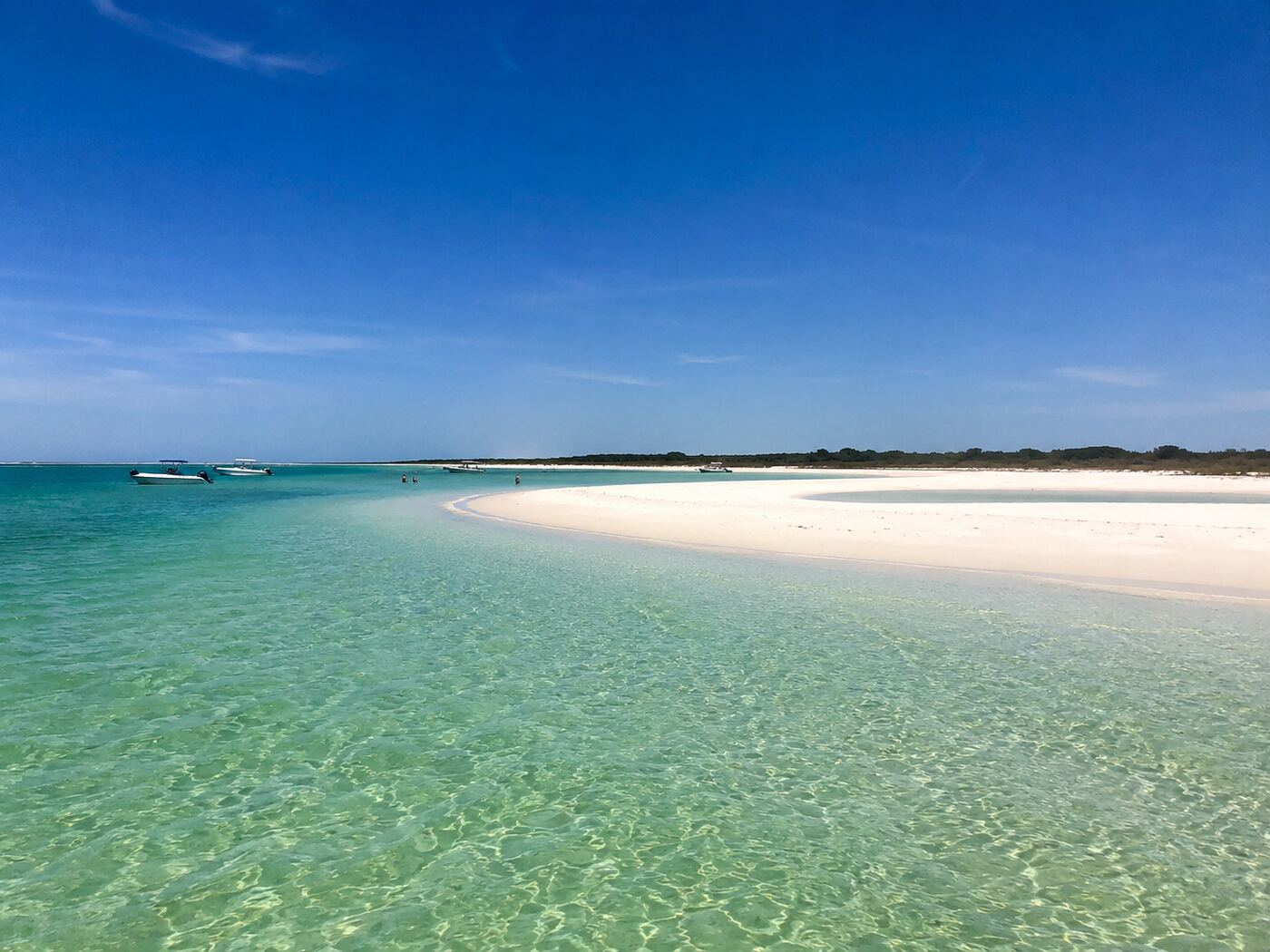 Secluded sandbar with clear shallow water near Shell Island
